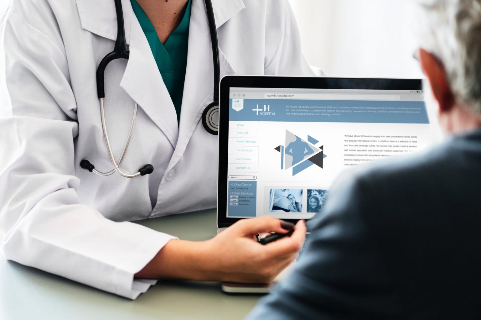 medical doctor showing a health report on a laptop to a patient