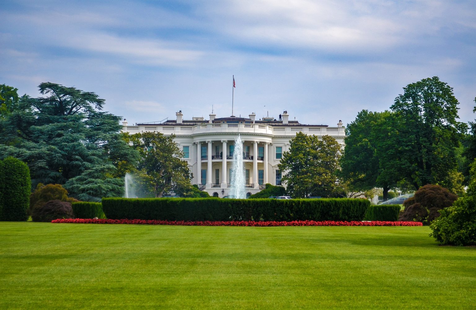 Outside view of the White House, Washington DC with a fountain in view