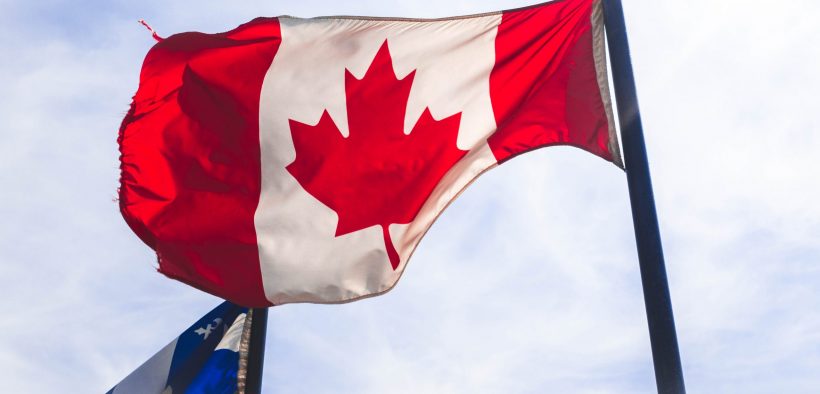 canadian flag blowing in the wind