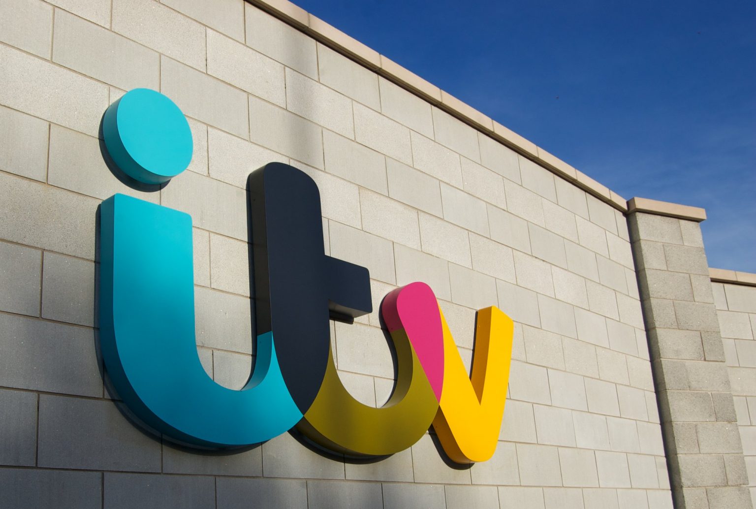 itv logo on a wall