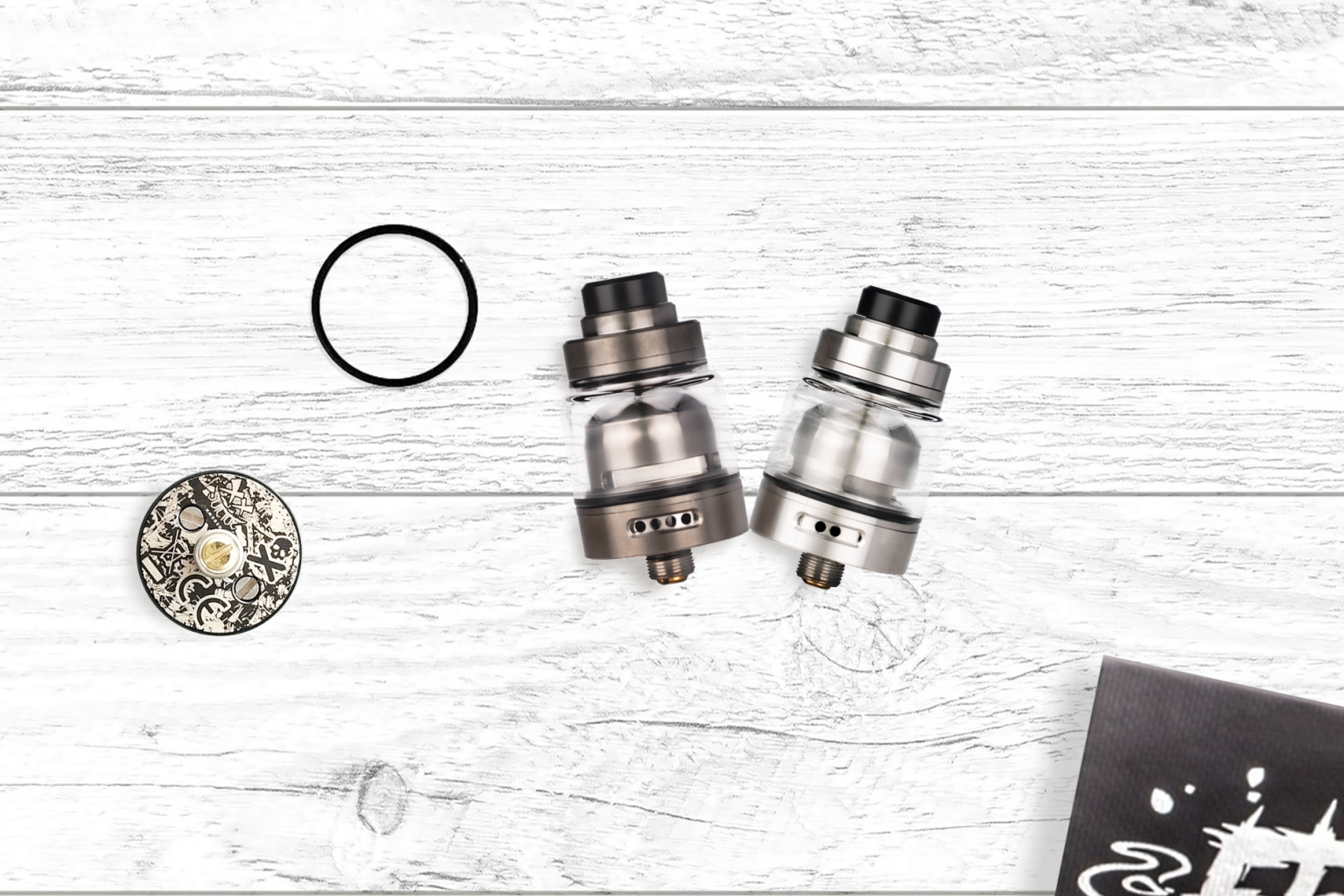 Vaping Bogan Ether RTA in chrome and silver