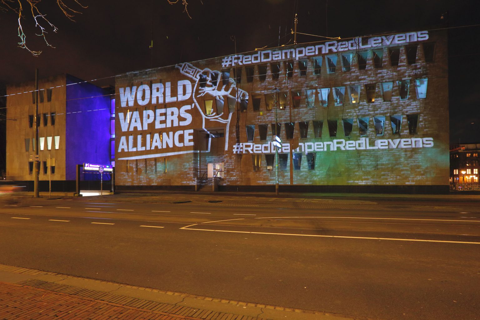 World Vapers Alliance logo lightshow on a building