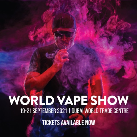 Man vaping and producing big clouds with a pink overlay World Vape Show 2021 image