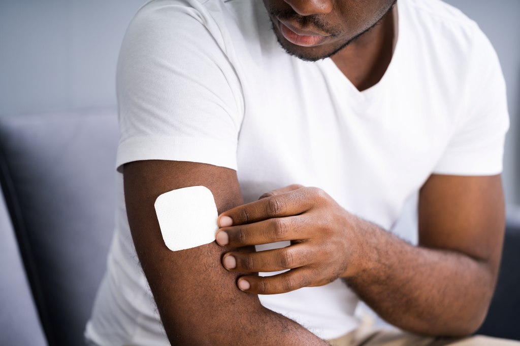 a man wearing a nicotine replacement therapy patch