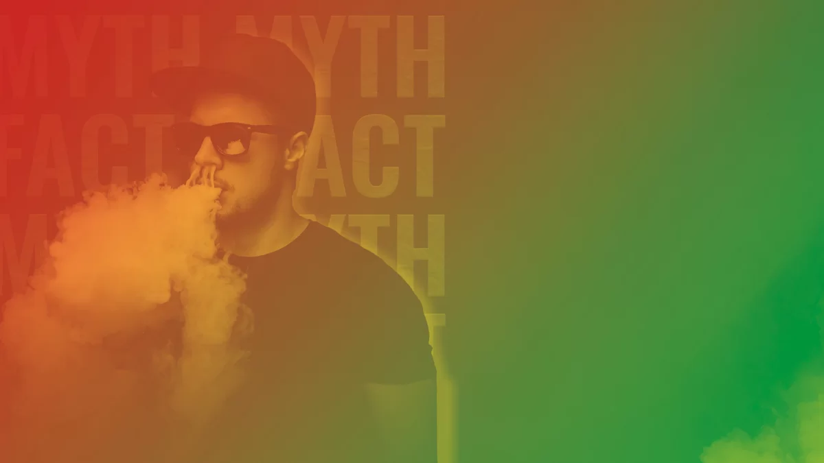 young man vaping a cloud with a red and green faded myth vs fact background