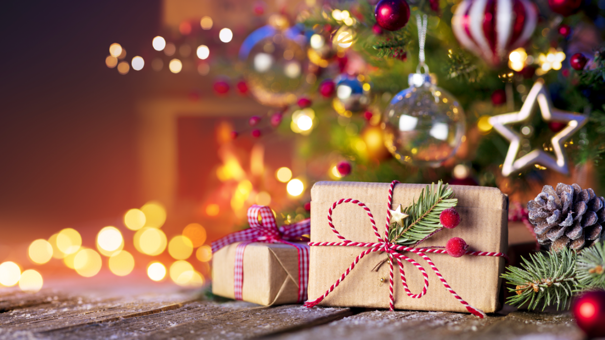 christmas gifts under a decorated christmas tree