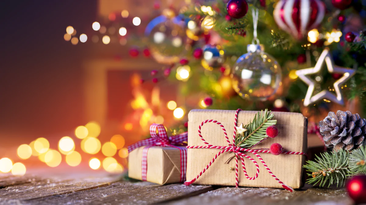 christmas gifts under a decorated christmas tree