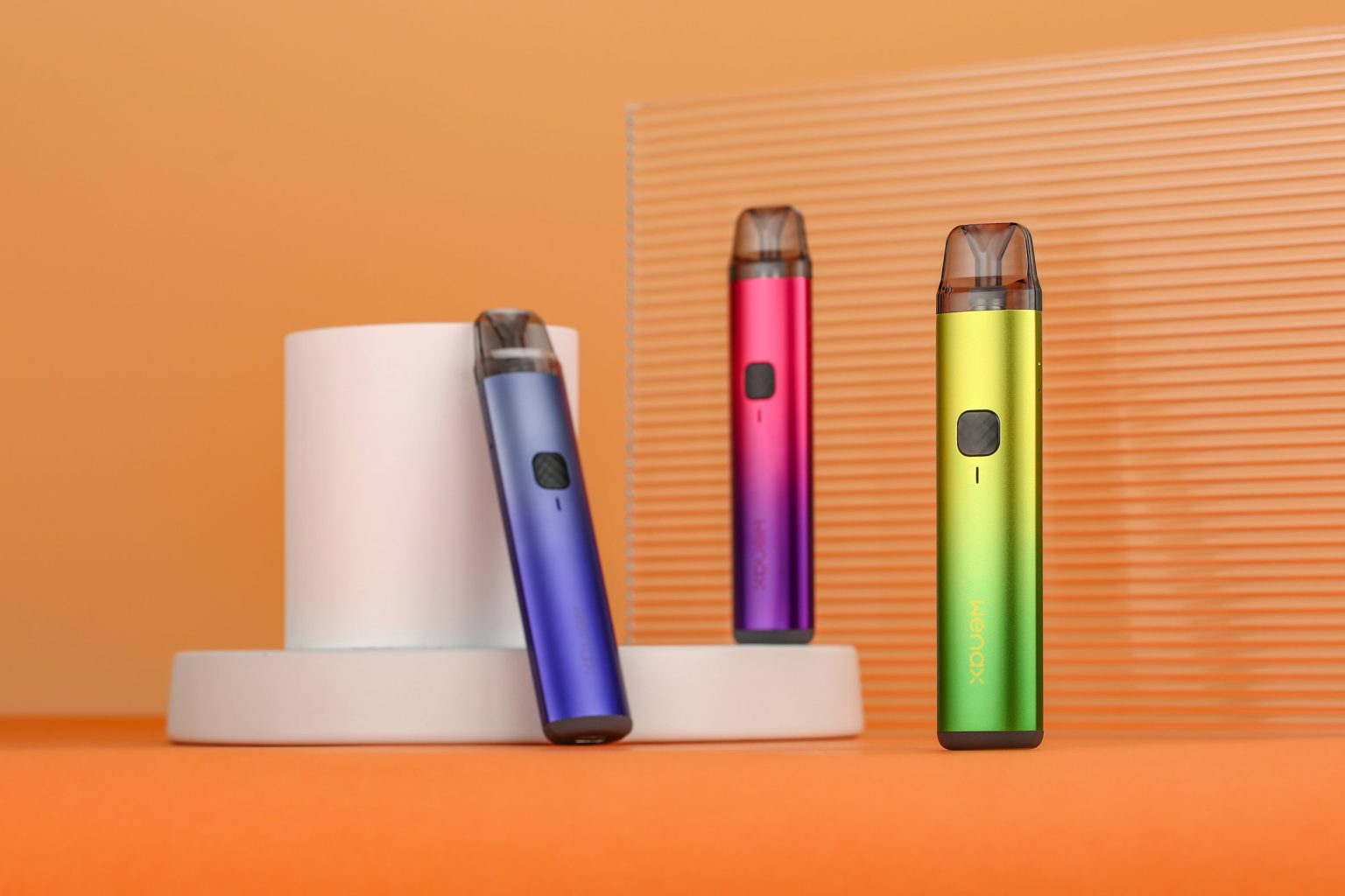 three geekvape wenax h1 devices in blue, pink and green