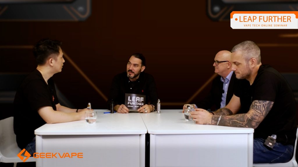 geekvape leap further online seminar - four vape industry men sat around a white table