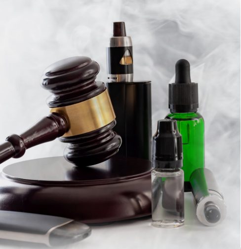 Judges happer surroudned by vape pods and eliquid