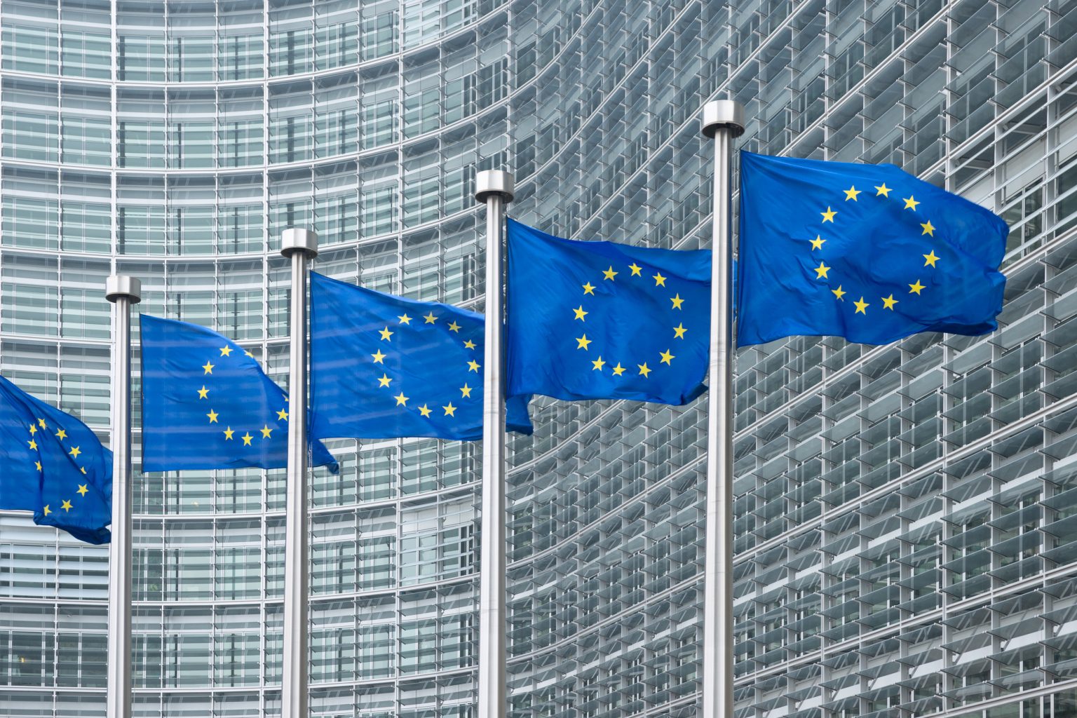 EU flags in front of European Commission in Brussels