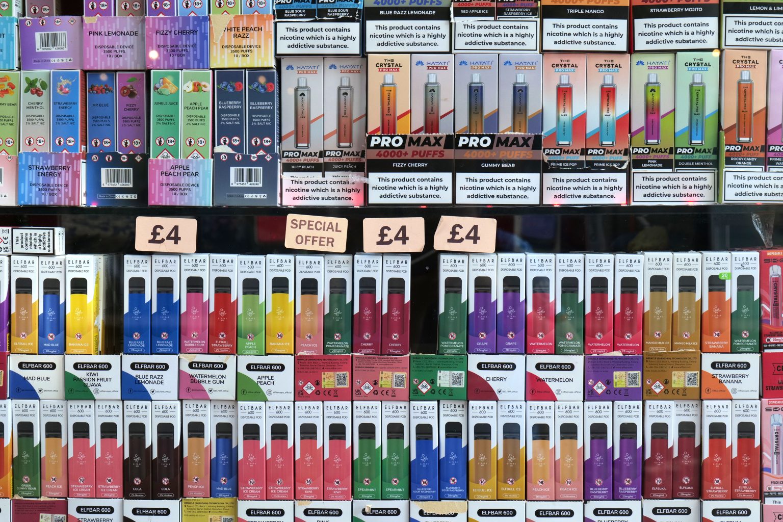 Electronic cigarettes, single-use disposable vapes displayed in UK shop window