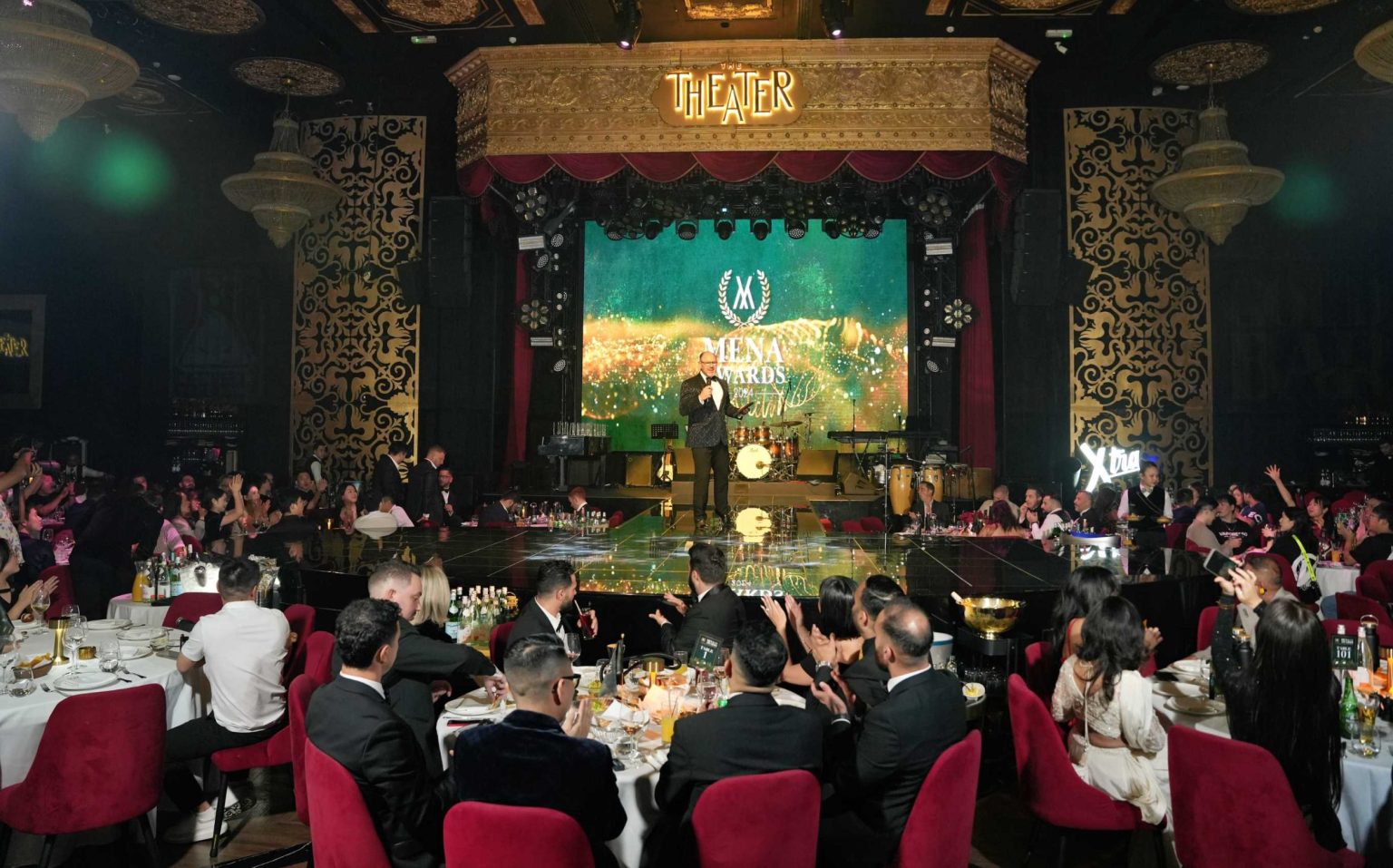 Attendees sat down as host of the MENA Vape Awards 2024 starts the official awards ceremony at The Theater, Fairmont Hotel, Dubai.