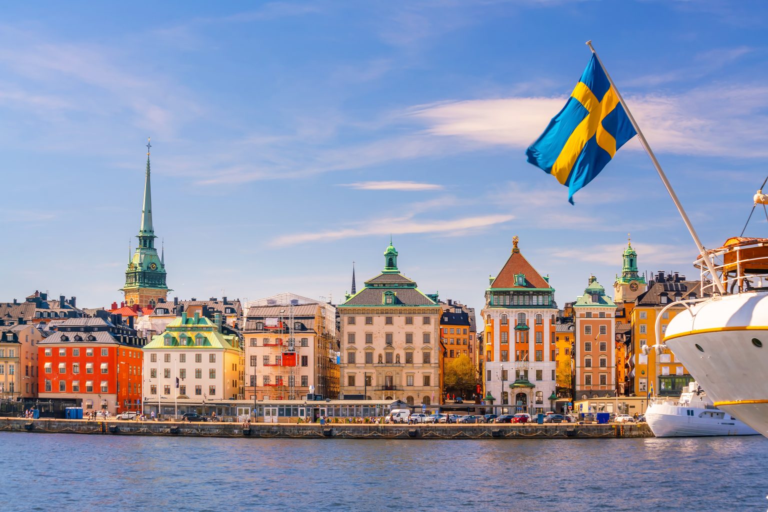 Stockholm old town city skyline with Swedish flag