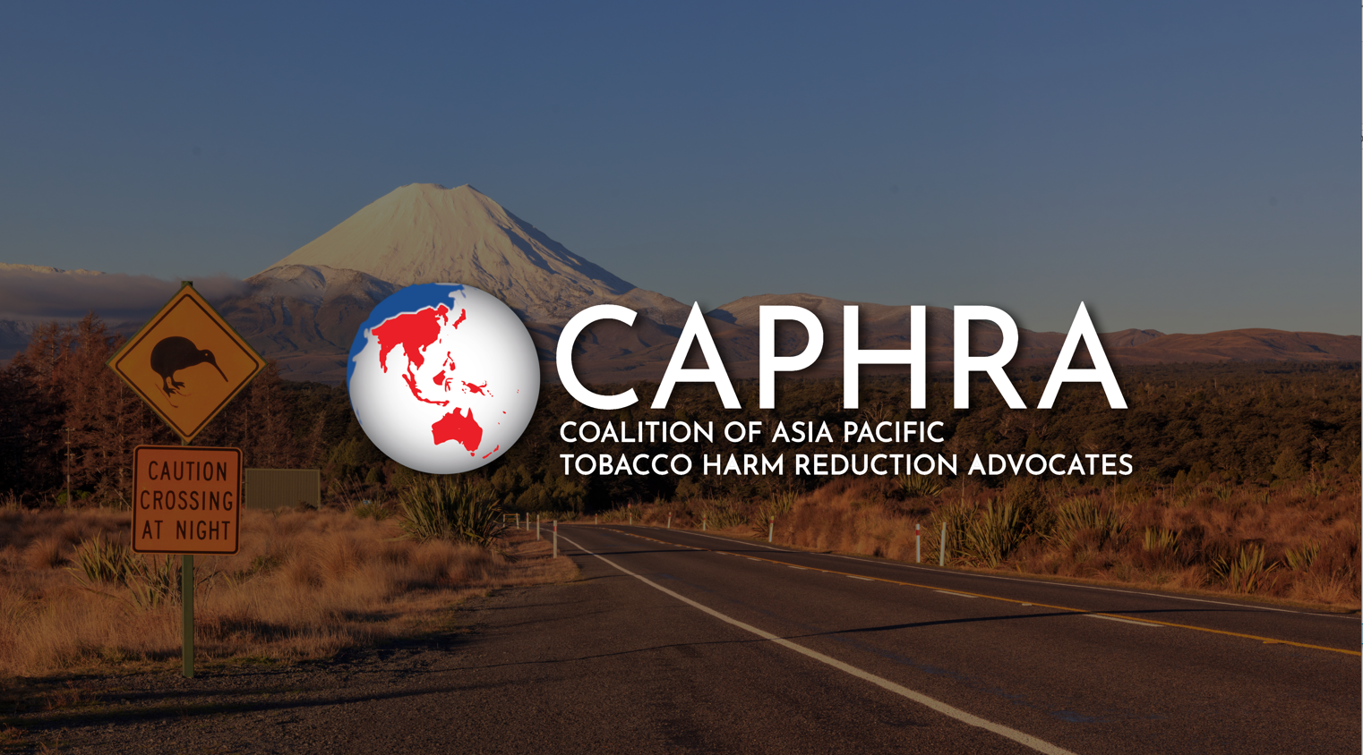 new zealand outback landscape with caphra white logo